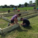 students build raised beds
